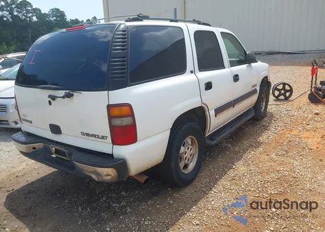 2002 Chevrolet Tahoe Ls from USA, damaged, VIN 1GNEC13V42J303653